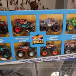 Hot Wheels -Monster Trucks, Set of 8 die-cast Toy Vehicles in The 1:64 Scale with Hero Figures and Fans' Favourite Figures from Monster Trucks.