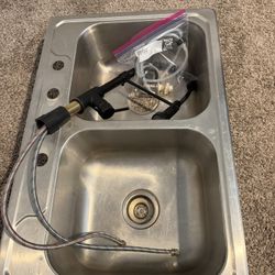 Sink And Black Faucet 