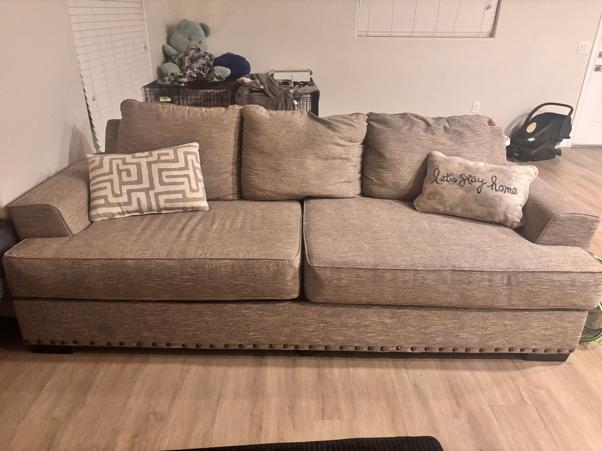 Beige Couch With 2 Decor Pillows