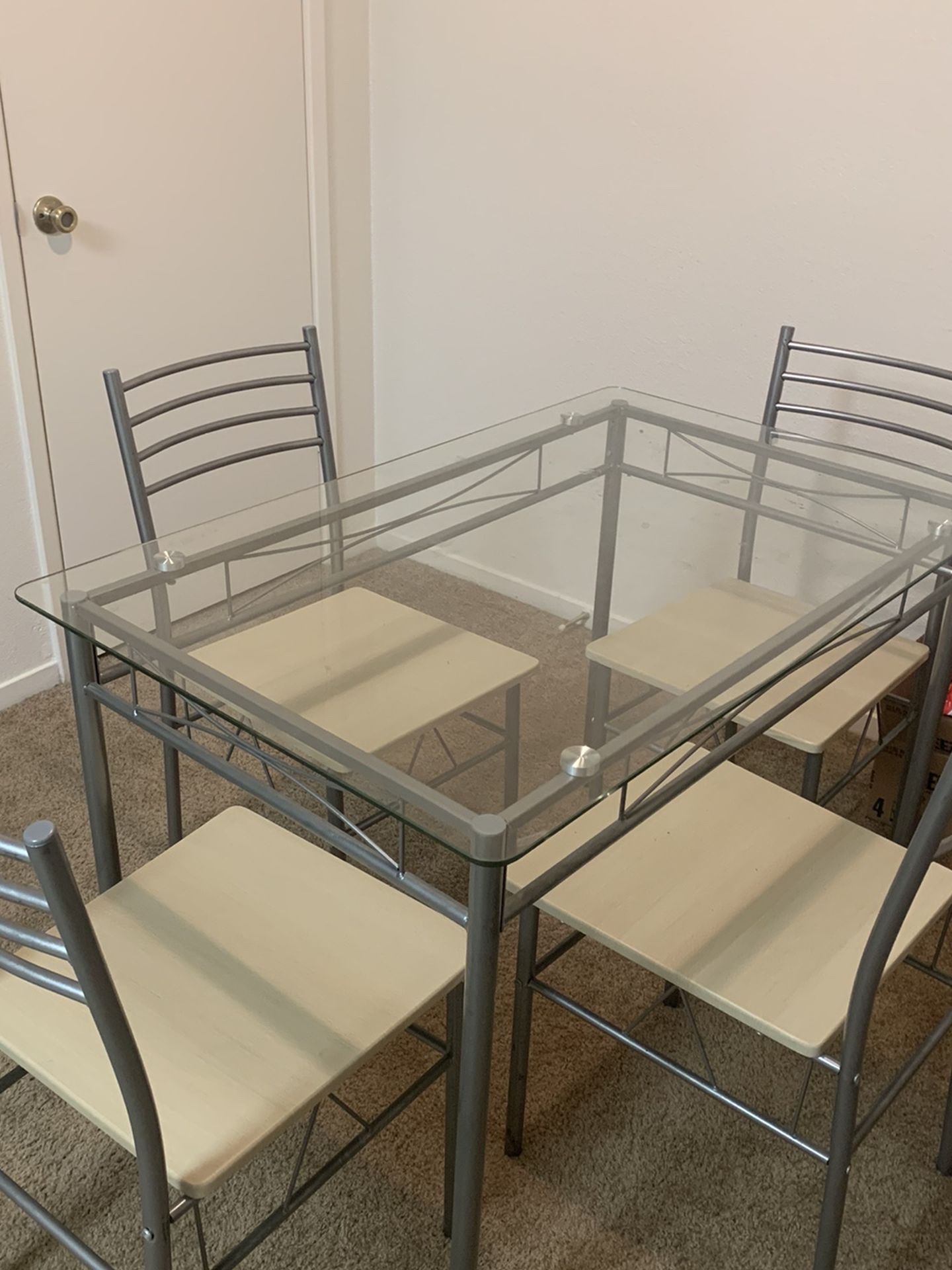 Glass Dining Table With Set Of Four Chairs