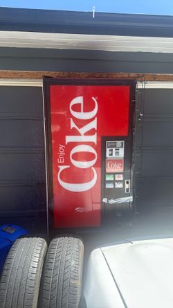 Old Coke machine. Needs work.