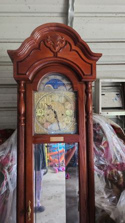 Ridgeway Grandfather Clock And Curio
