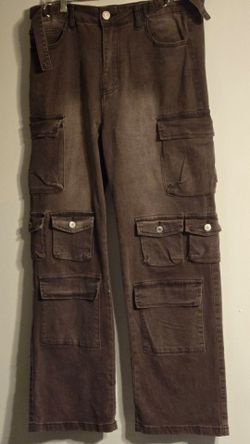 A Pair Of brown jeans with lots of pockets