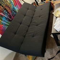 IKEA Black Futon Sofa. 