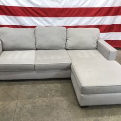 Free Delivery - Living Spaces Couch With Reversible Chase