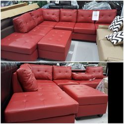 New red sectional and ottoman
