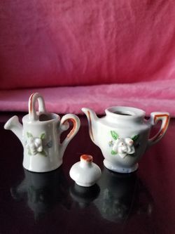 Porcelain watering can and Minnie teapot vintage