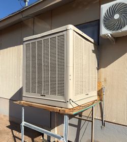 Air conditioning swamp cooler