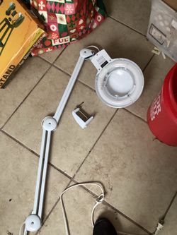 Drafting table magnifying light