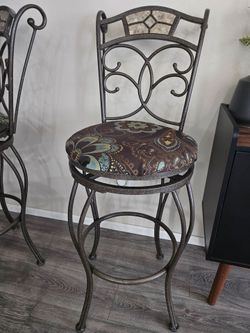 Three identical bar stools
