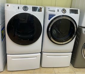 Ge front  load washer and dryer electric
