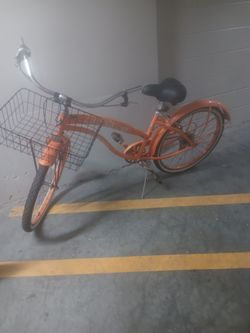 Orange Cruiser Bicycle with Front Basket