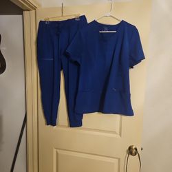 Scrubs Sets Name Brand  Infinity  Tops XL, Pants  Large. 3sets Total.$10 Each Set Like New Condition. 