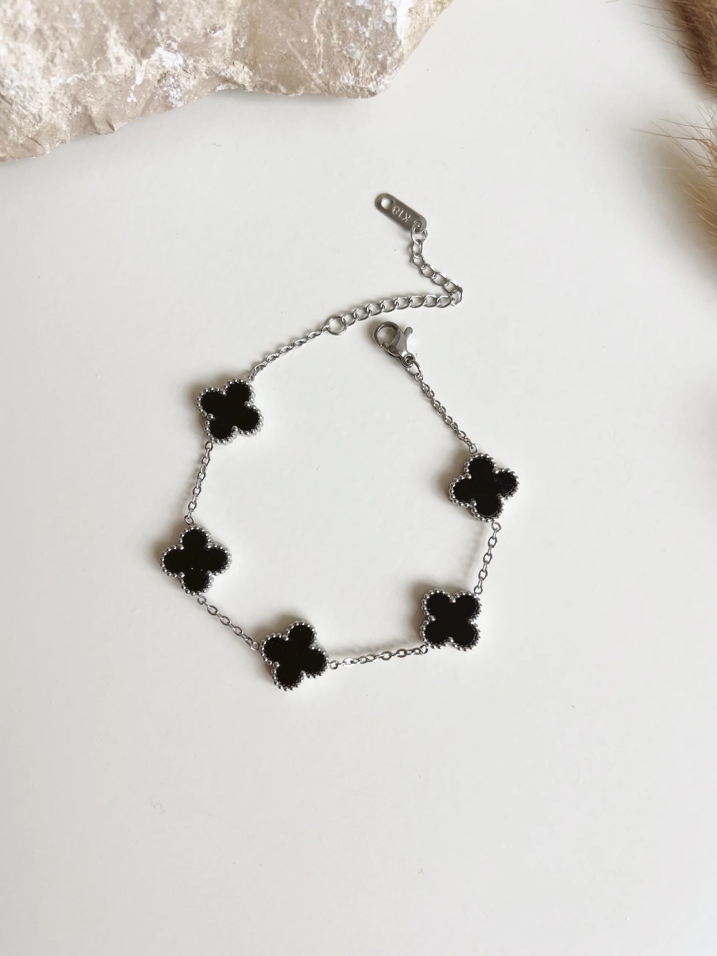 Brand new Van Cleef & Arpels silver and black onyx clover