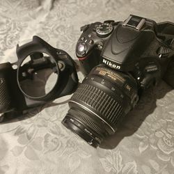 Nikon D5100 W/ DX AF-S Nikkor 18-55mm 1:3.5-5.6G Lens