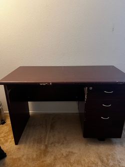 Table with three drawers