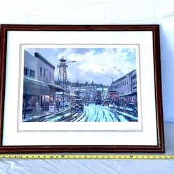 Vintage 30” x 24” Framed, Signed (THOMAS Kinkade) “ Placerville In The Snow” Lithograph Picture. Valued At Over $200.
