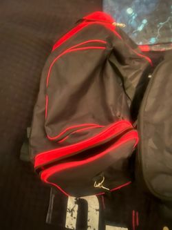 Black, Blue and Red Travel Bags