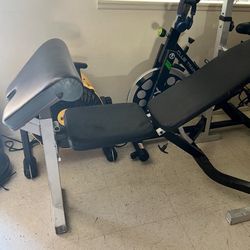 spinning bike and weight table together