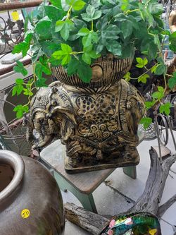 Cool large elephant planter with artificial plant