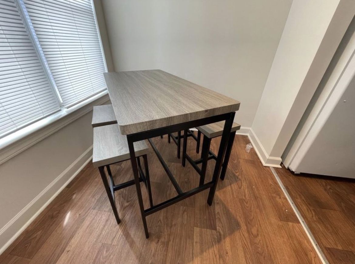 BRAND NEW COUNTER HEIGHT 5 PIECE BREAKFAST NOOK $345! YOU DON’T PAY UNTIL WE DELIVER!! Get this well crafted and solid wood finished with metal base