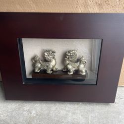 Wooden Shadowbox With Dragon Foo Dog Sculptures. Linen backdrop. 22”Wx16”1/2Hx3”D Excellent Condition $40 Firm On Price
