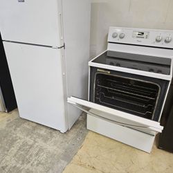 Hotpoint 28in Top And Bottom Refrigerator And Whirlpool Electric Stove Used Good Conditions S 