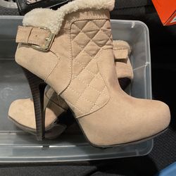 Beige high heel boots