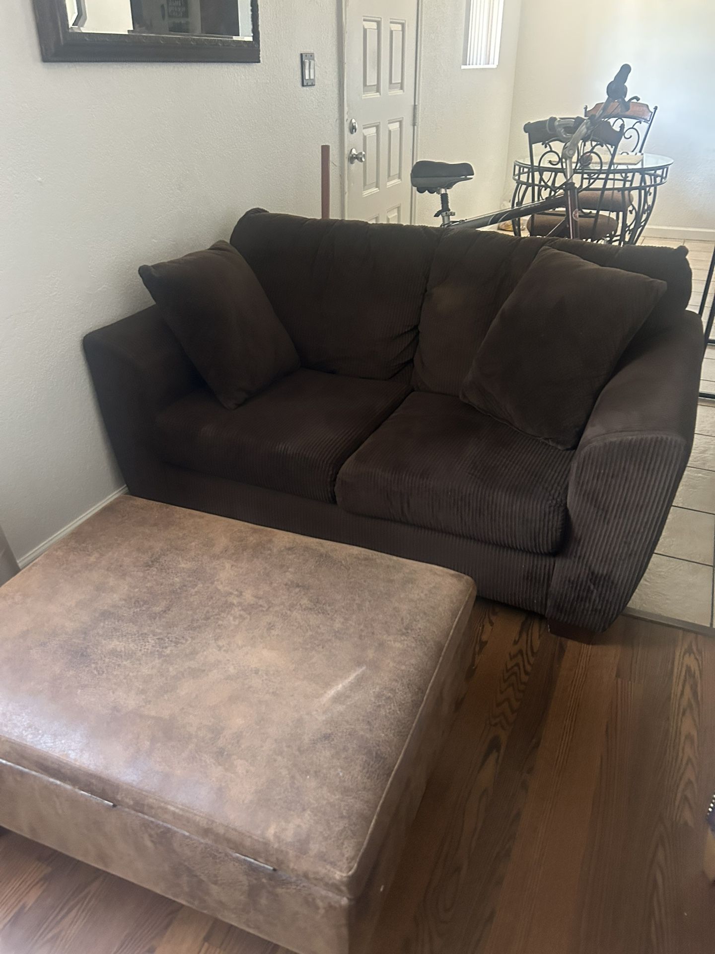 Brown loveseat