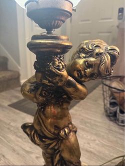 Pair Hollywood Regency style gilt cherub (putti) table lamps.