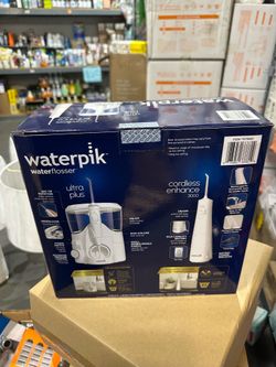 [214].  Waterpik Ultra Plus and Cordless Enhance 3000 Water Flosser Combo Pack