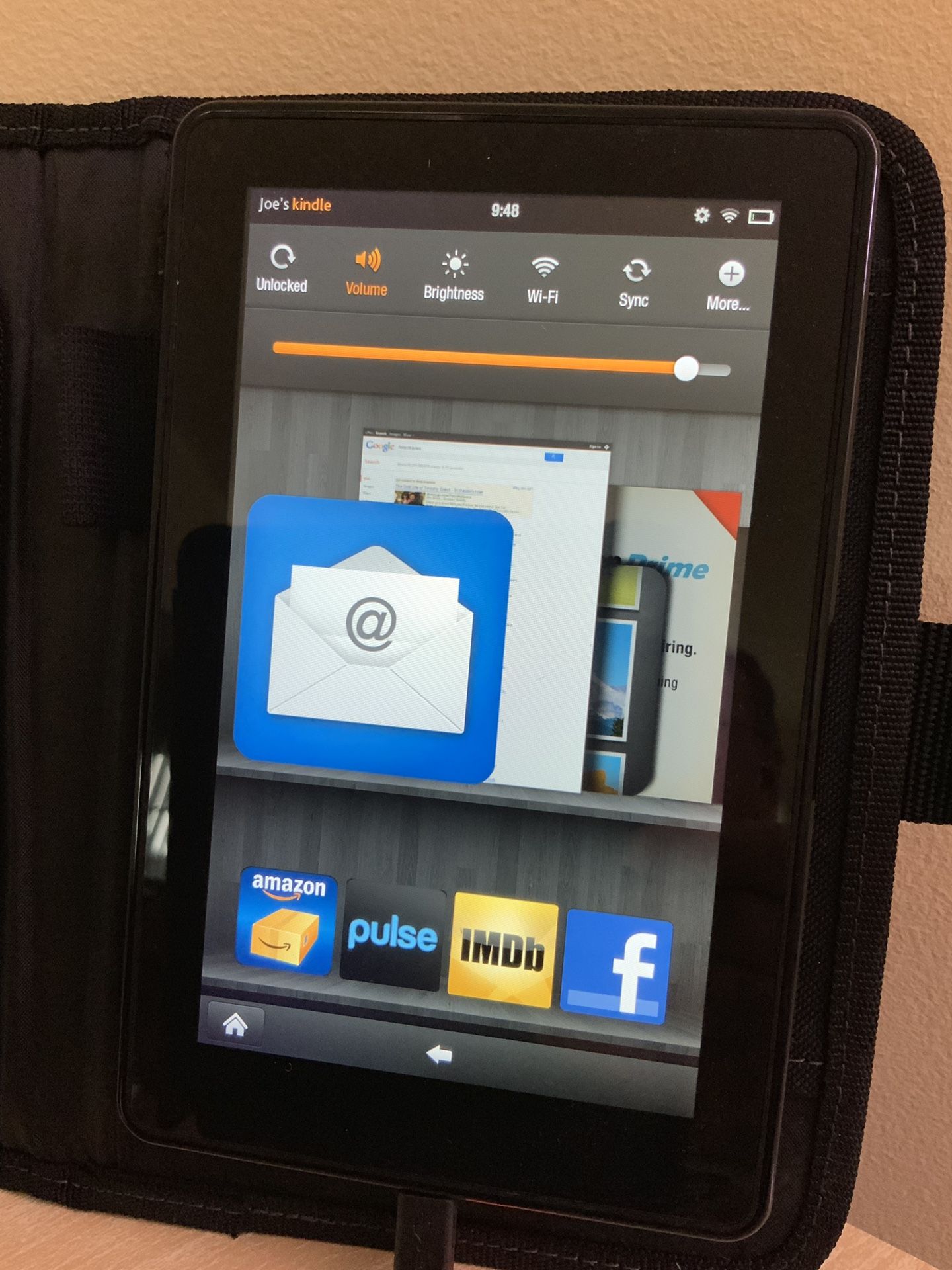 Amazon Kindle Fire tablet with a new DeWALT business carrying case, device adapted to case. Wi-Fi ready, runs on a modified version of Android OS.