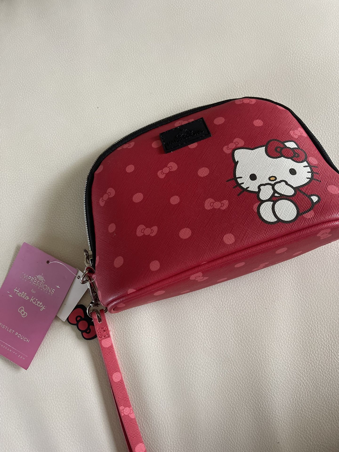 Impressions hello kitty red wristlet pouch