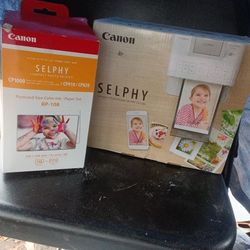 Canon Selphy Compact Photo Printer W/1 Box Of 108 Sheets Picture Paper With Ink Refill