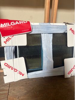New Milgard Black Vinyl New Construction slider window