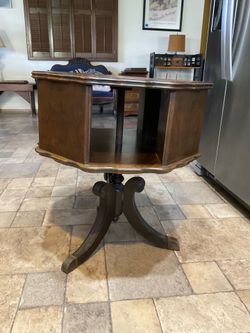 ANTIQUE TABLE THAT SWIVELS