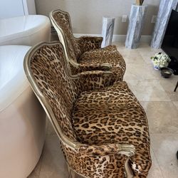 Pair Of French Louis XV style bergère armchairs upholstered in a leopard print velvet