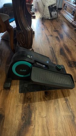 Cubii under table leg exercise machine.