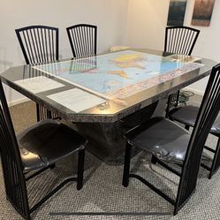 Custom made dining table with six chairs and custom-made heavy duty glass in top