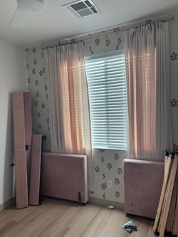 Pink bed frame and mattress