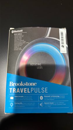 Brookstone TravelPulse Wireless LED Speaker, with Bluetooth, colored LED lights and carrying it.