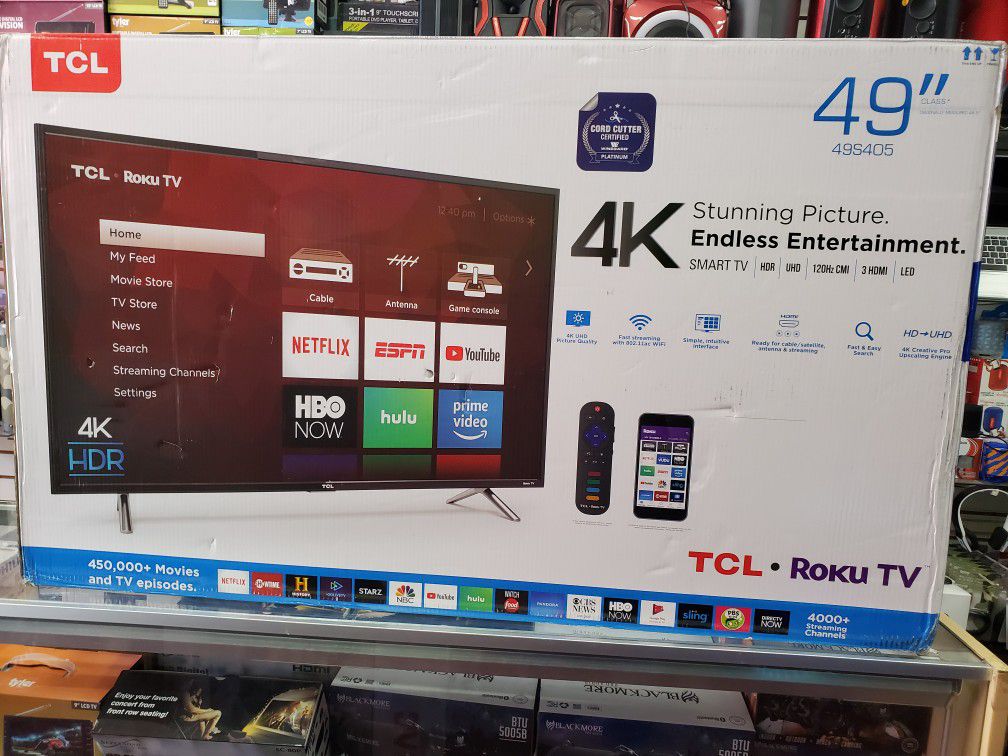 BRAND NEW IN BOX. 49" LED SMART TV AVAILABLE BY TCL WITH HDR AND ROKU STREAMING.