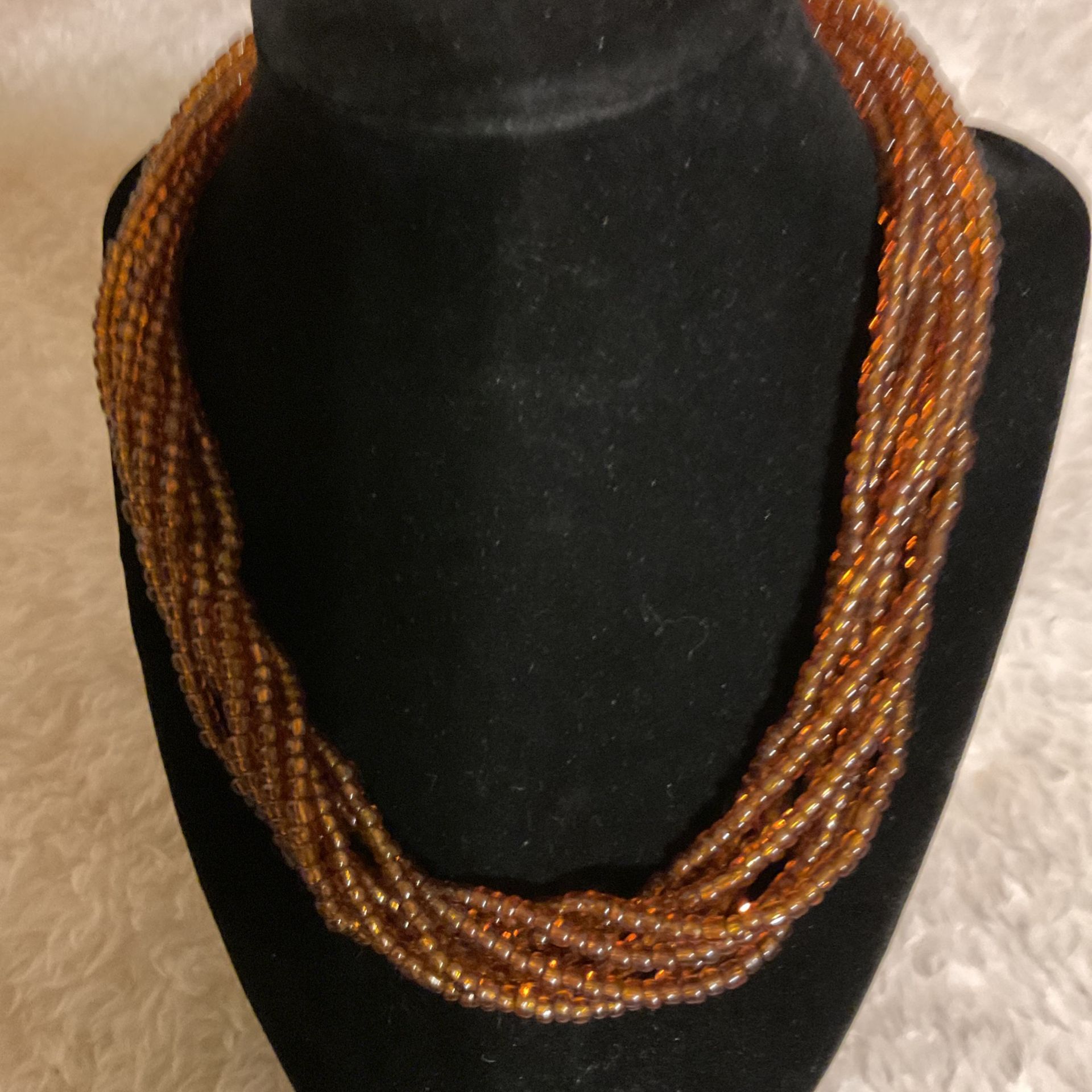 Multiple Strand Amber Color Beaded Necklace