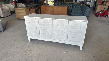 White Wood Sideboard with Geometric Door Panels
