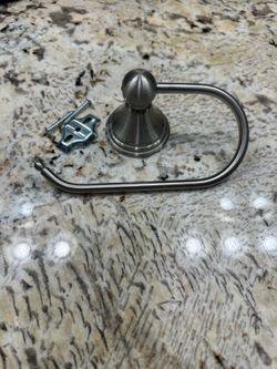 Pfister bathroom faucets (4) and toilet paper holder