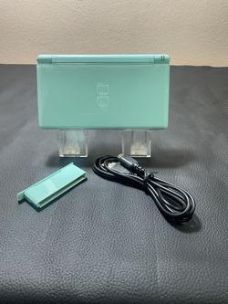 Nintendo DS Lite in Ice Blue with USB cable.