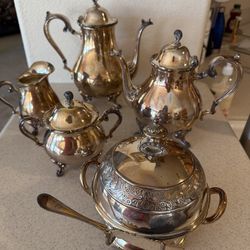 Two Boxes of Silver Plate Serving Sets and Candle Holders