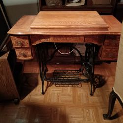Brunswick antique Sewing machine inside Wood Sewing Desk