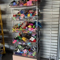 Display rack with toys on it no wheels $100