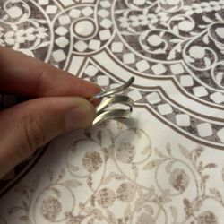 Size 8 stearling silver ring can be adjusted slightly bended  